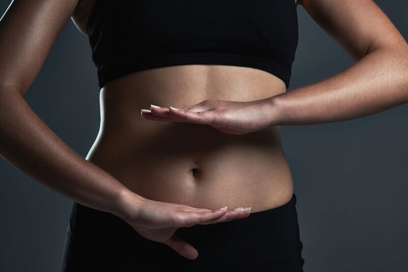 glutened stomach, woman feeling bloated
