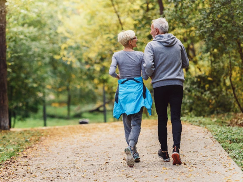 couple out jogging together to illustrate managing hormone imbalance symptoms