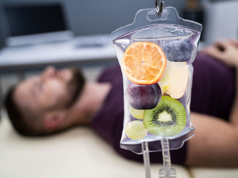 fruit slices in saline bag to illustrate IV micronutrient therapy