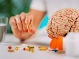 a brain and some supplements offering a choice of how to maintain cognitive function
