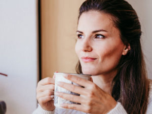 woman having cup of tea