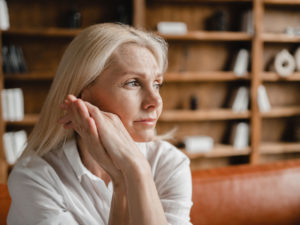 stressed woman to illustrate menopausal symptoms