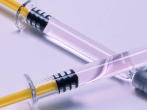 syringes to illustrate the use of semaglutide injections