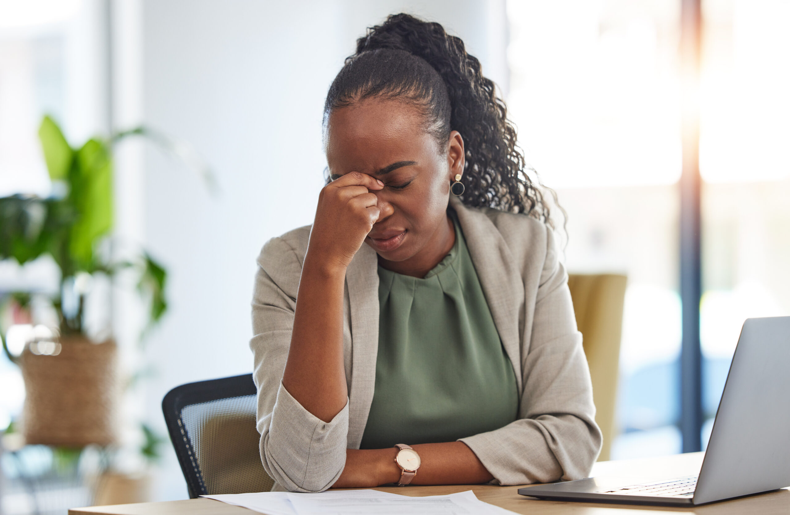 Crisis, stress and black woman with problem in office, sick or headache from brain fog. Frustrated, fatigue and African professional with business fail, mistake emoji or debt, bankruptcy or tax audi