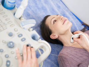 patient undergoing thyroid ultrasound exam