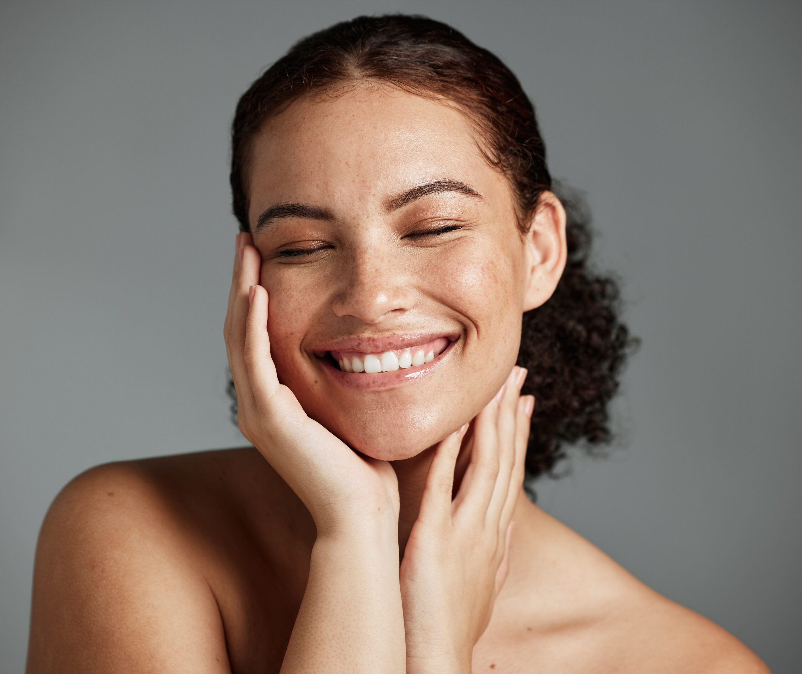 Licensed Save to Library Preview Crop Find Similar File #: 560695369 Face, beauty and satisfaction with a model black woman in studio on a gray background to promote natural skincare. Facial, wellness and makeup with an attractive young female happy with cosmetics