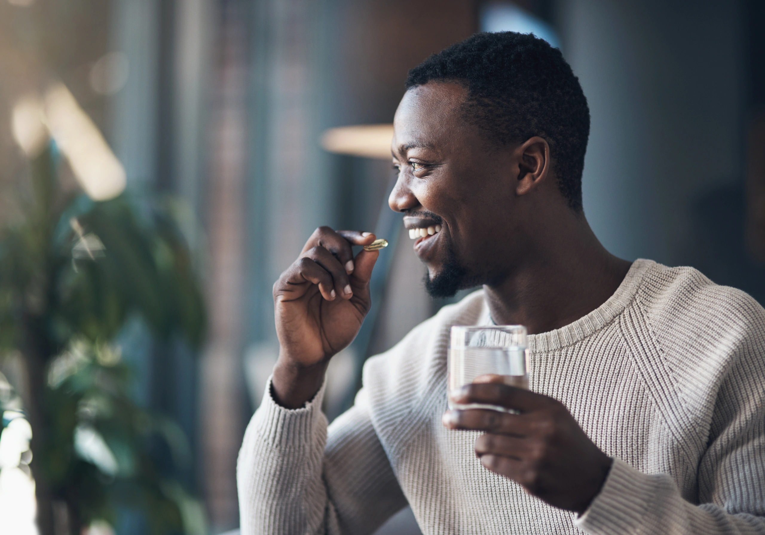 man taking supplement