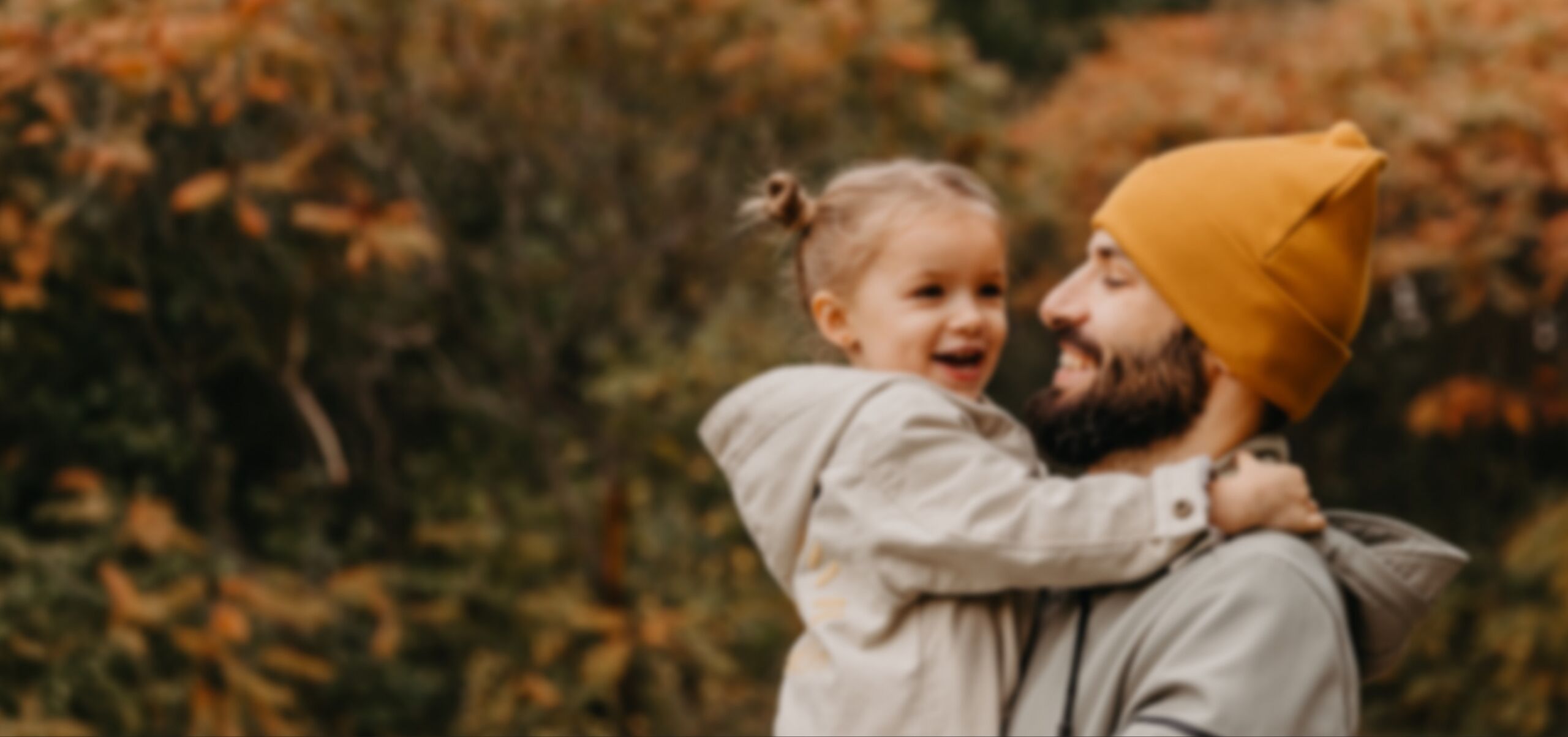 Father holding his daughter